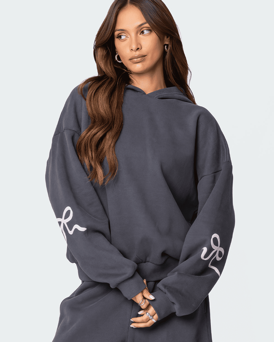 SORELLIA BOW HOODIE™